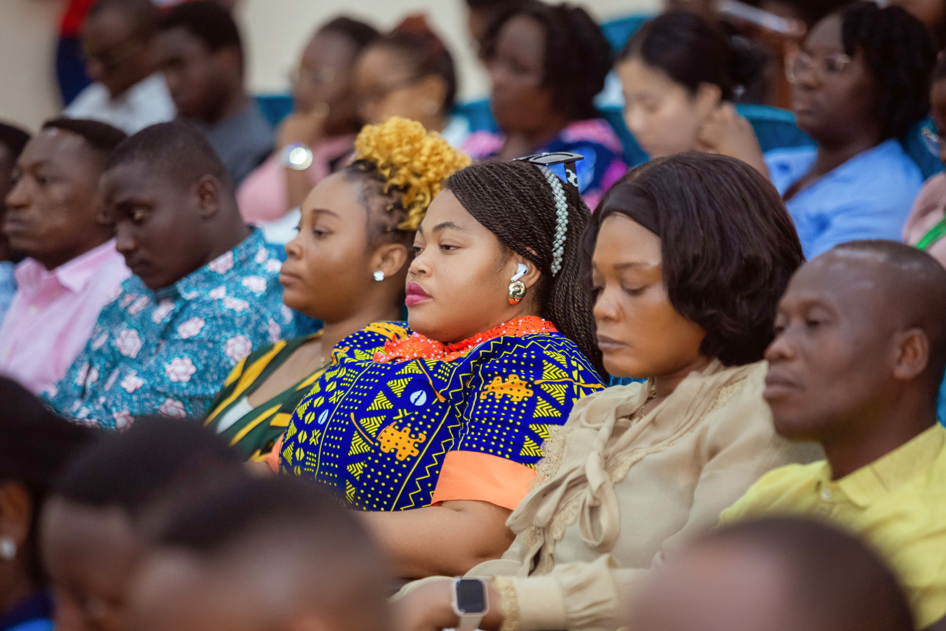 Listeners in the audience during a session