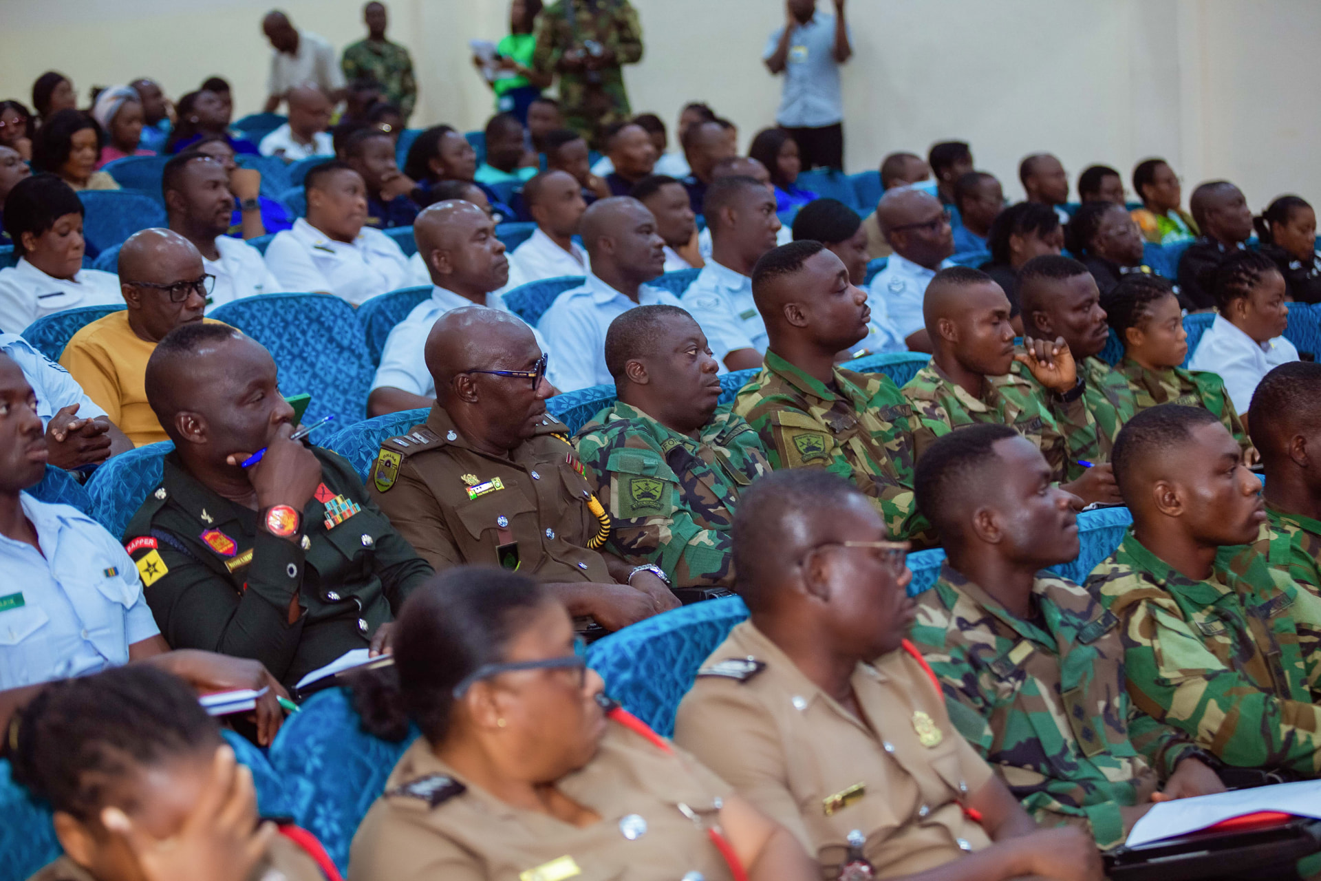 A full auditorium of military, security and media participants